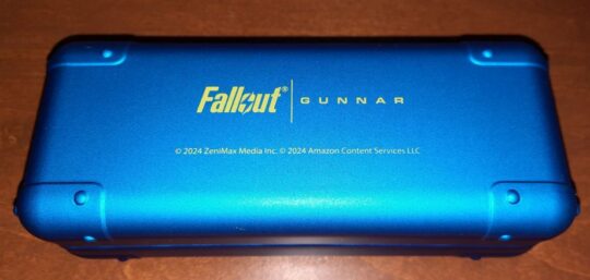 The distinctive Fallout Vault 33 glasses case